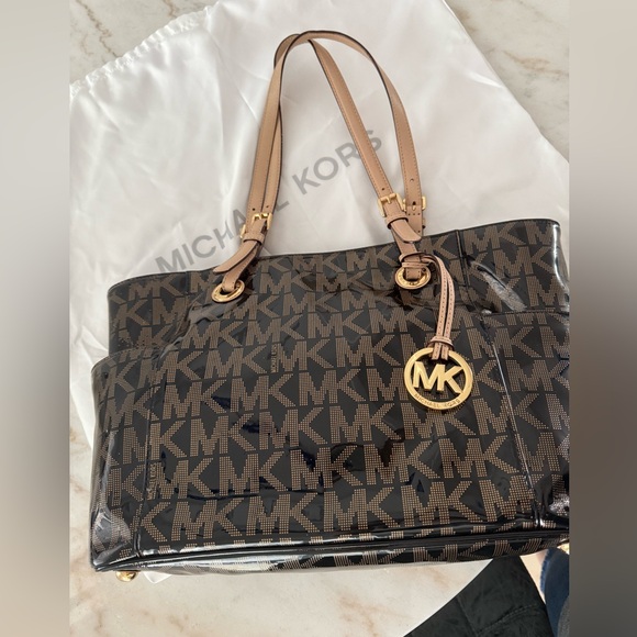 Michael Kors Black and Tan Signature Backpack - Picture 9 of 15